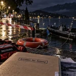 Lac Annecy accident : balisage rouge et blanc sur la berge du lac